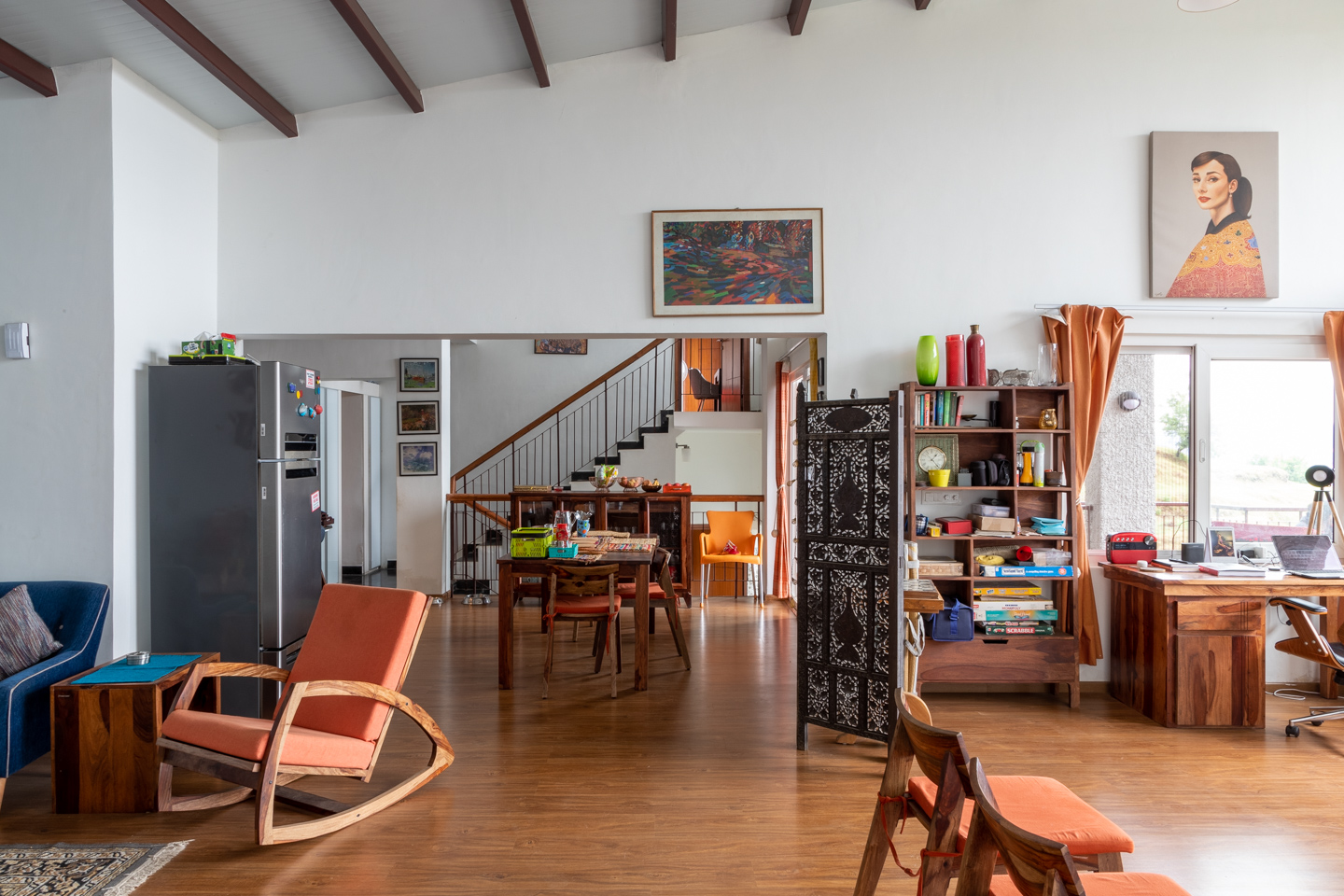 The living room with the dining room beyond