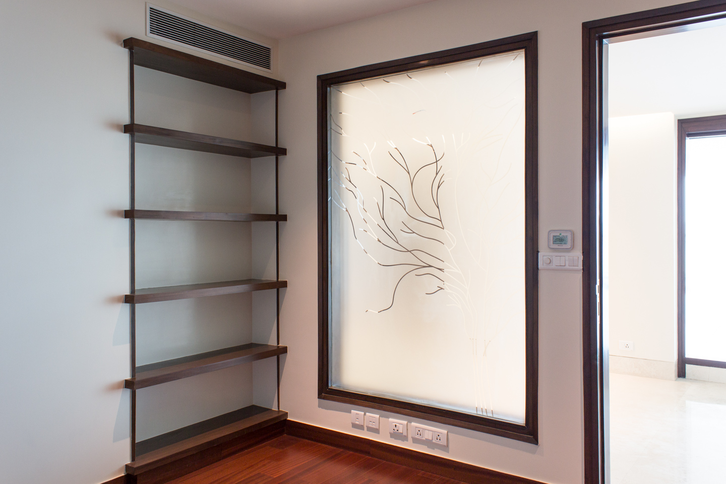 The study, with a frosted glass window facing the corridor.